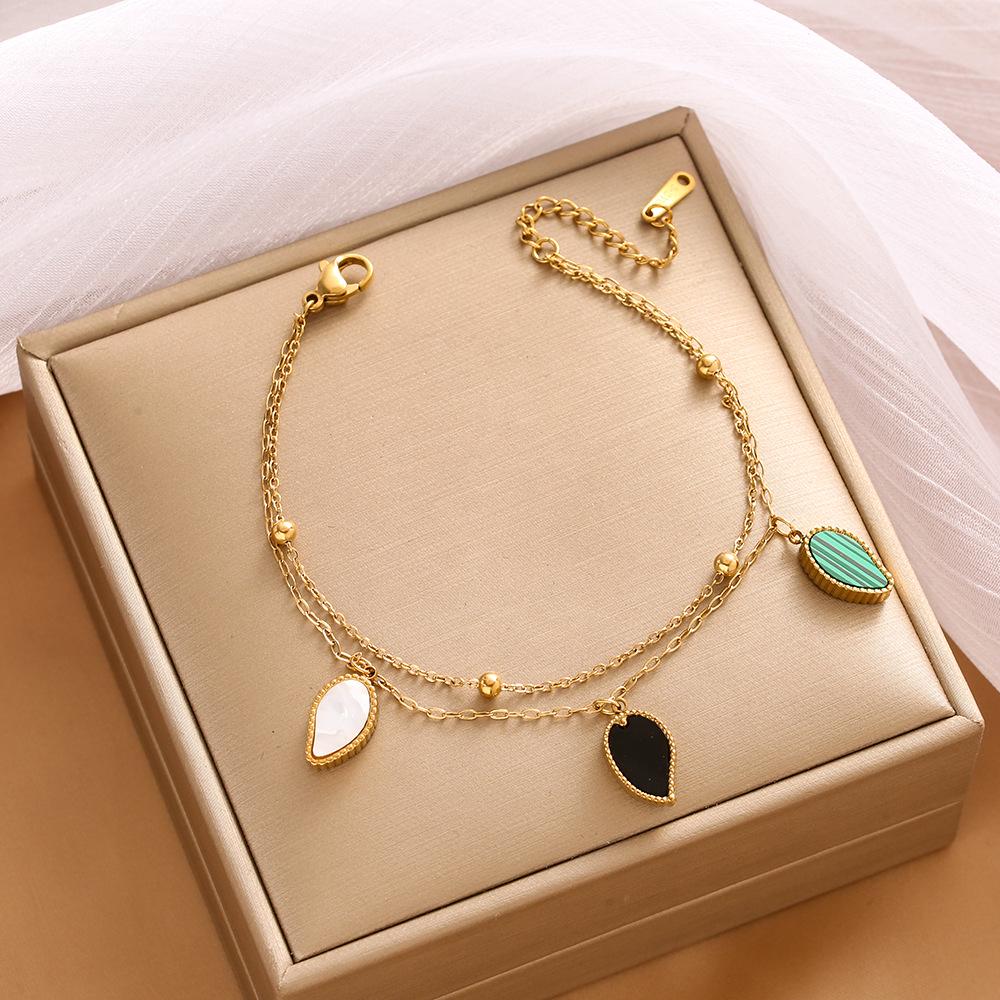 High-End Titanium Steel Four-Leaf Clover Bracelet with Shell Pendant – Durable, Fade-Resistant Design