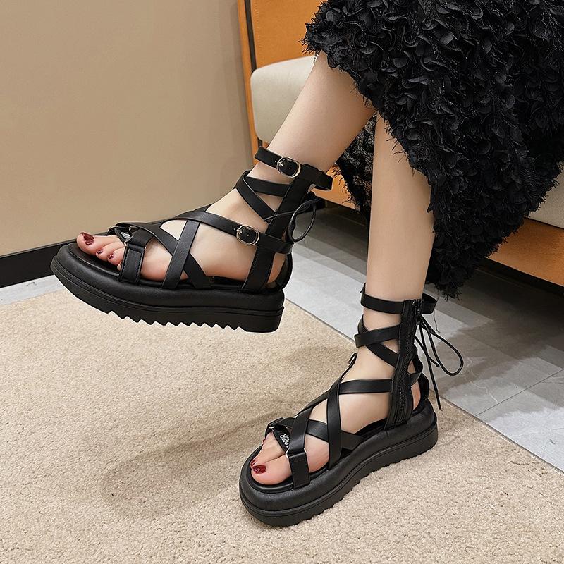 

Fairy wind straps Roman sandals female outer wear 2025 new beautiful flat-bottomed hollow high-top shoes thick-soled cool boots 40