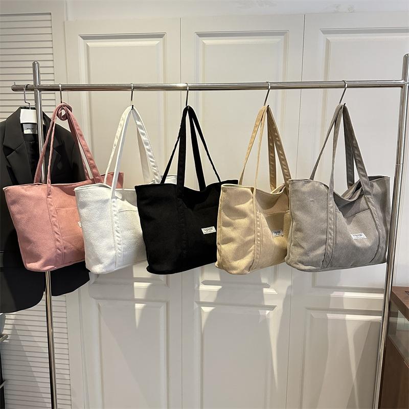 Casual simple portable tote bag women's autumn new largecapacity shoulder bag commuter casual armpit bag