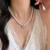 Light Luxury Niche High-end Shijia Pearl Bow Pendant Necklace Women's New Temperament Beaded Collarbone Chain Neck Chain