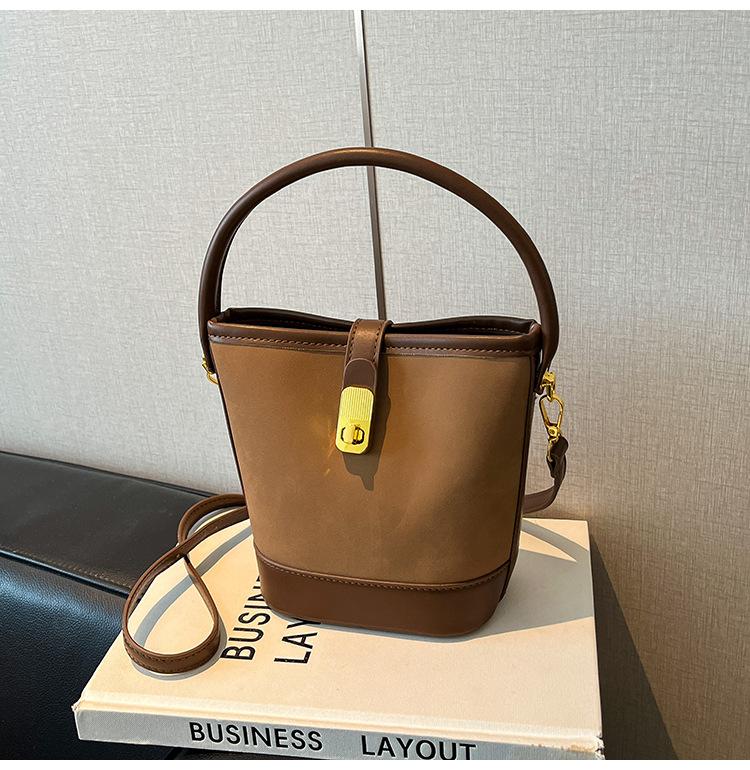 

Retro contrasting small bag women s 2025 new popular fashionable and foreign versatile portable bucket bag commuter messenger bag