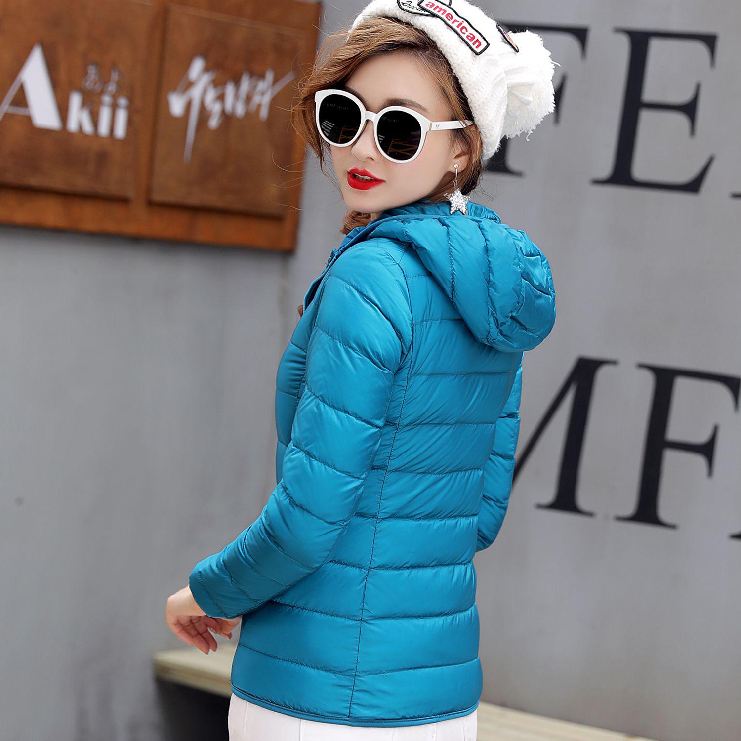

Жіноча легка пухова куртка з капюшоном у корейській версії The Short Ladies White Duck Down Lightweight Down Serving Women S озеро синього кольору