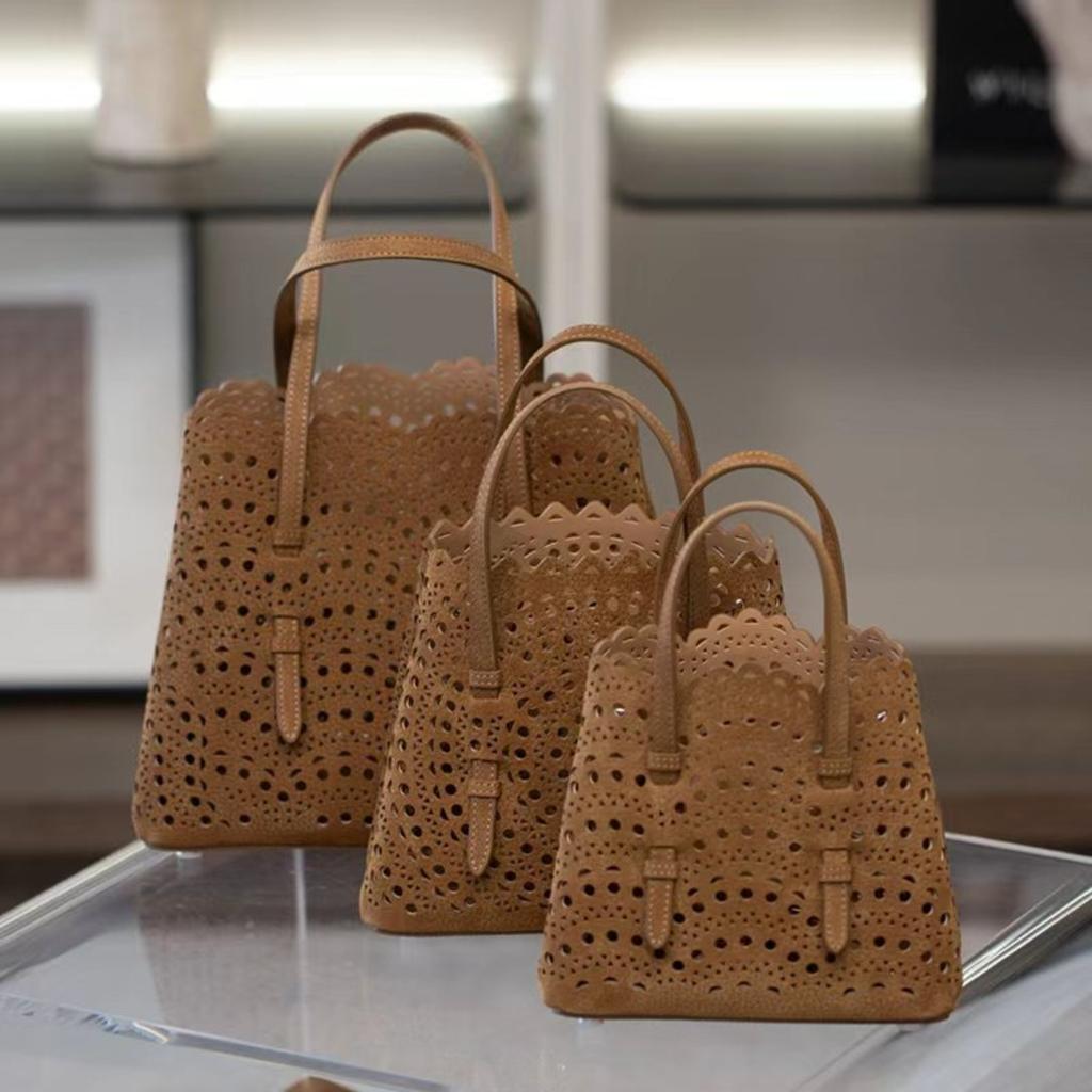 Velkoobchodní továrna prémiová niche vyřezávaná dutá taška na zeleninu Mina kožená dámská taška přes rameno crossbody tote taška