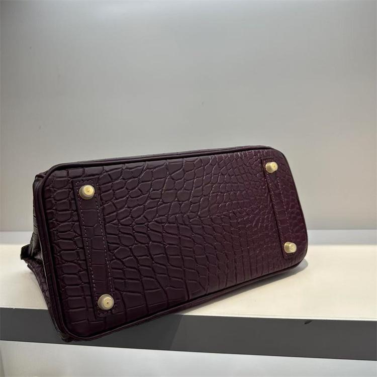Pelle bovina primo strato motivo alligatore opaca portatile a spalla a tracolla borsa da donna premium transfrontaliera