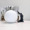 Artistic Ball-Holding Figure Sculpture: C-Shaped Decoration for Hotel & Display Cabinets