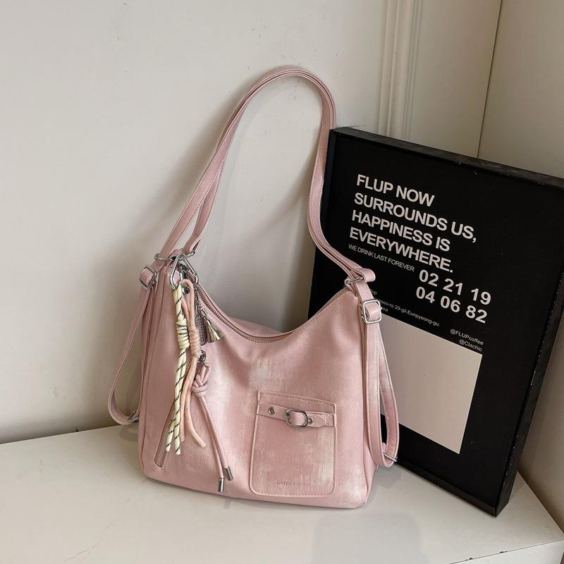 

Atmospheric commuting temperament handbag autumn new shoulder underarm women s bag literary tote bag рожевий