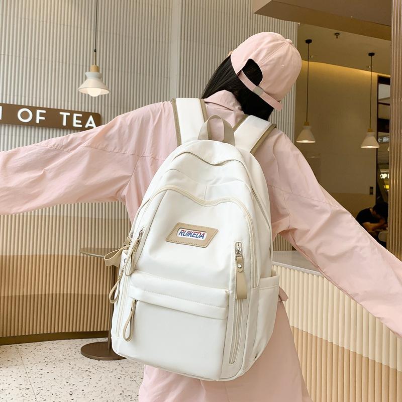 

New student schoolbag, same for men and women, spliced Korean version of casual backpack, large-capacity campus backpack белый