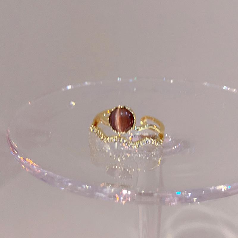 Electroplated Korean artificial opal zir*****pen ring, a sexy index finger ring jewelry.