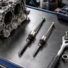 Stem Seal Replacement Tool with Threaded Rod and Contact Face for Controlling Crankshaft Position During Service