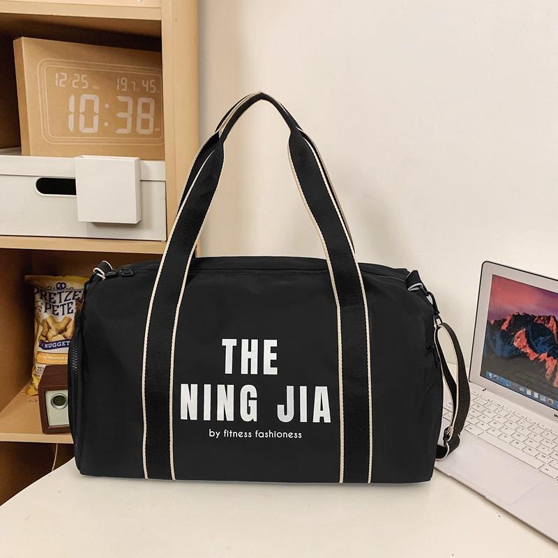 

Travel bag Large capacity messenger sports backpack Short business trip Hand luggage bag Dry and wet separation fitness bag чорний