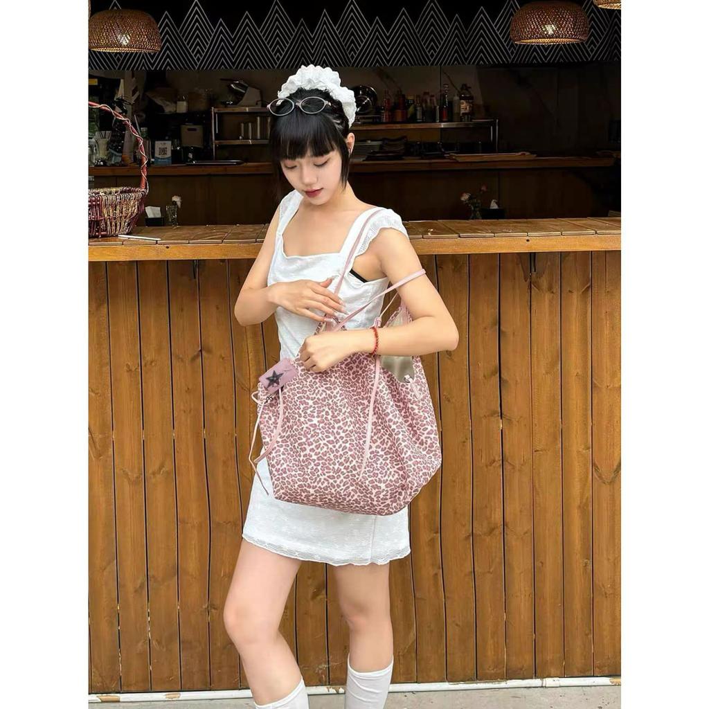 Frühlings- und Sommer-Lässiger Wind Leopardenmuster Umhängetasche Große Kapazität Mode Wind Canvas Damenhandtasche