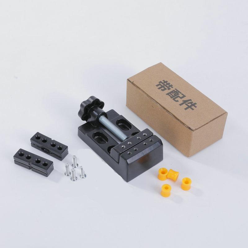 Aluminum Alloy Multifunctional Mini Bench Vise with Eight-Hole Flat-Mouth Pliers for Creative Projects and Walnut Accessories.