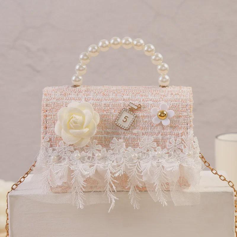 

Сумка для малышей Xiaoxiangfeng Snowflake Velvet Princess с жемчужной ручкой розовый