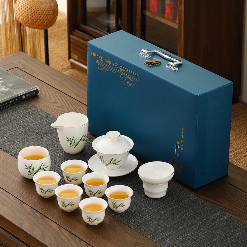 Suet jade porcelain Kung Fu tea tea set, household full set of ceramic tea cup cover bowl Dehua white porcelain tea maker