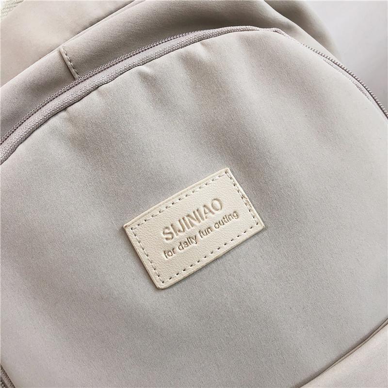 Kvinners ryggsekk Ensfarget kvinnelig multi-lomme Uformell reiseveske for kvinner Høykvalitets skolesekk for tenåringsjente Bok-rygsekk