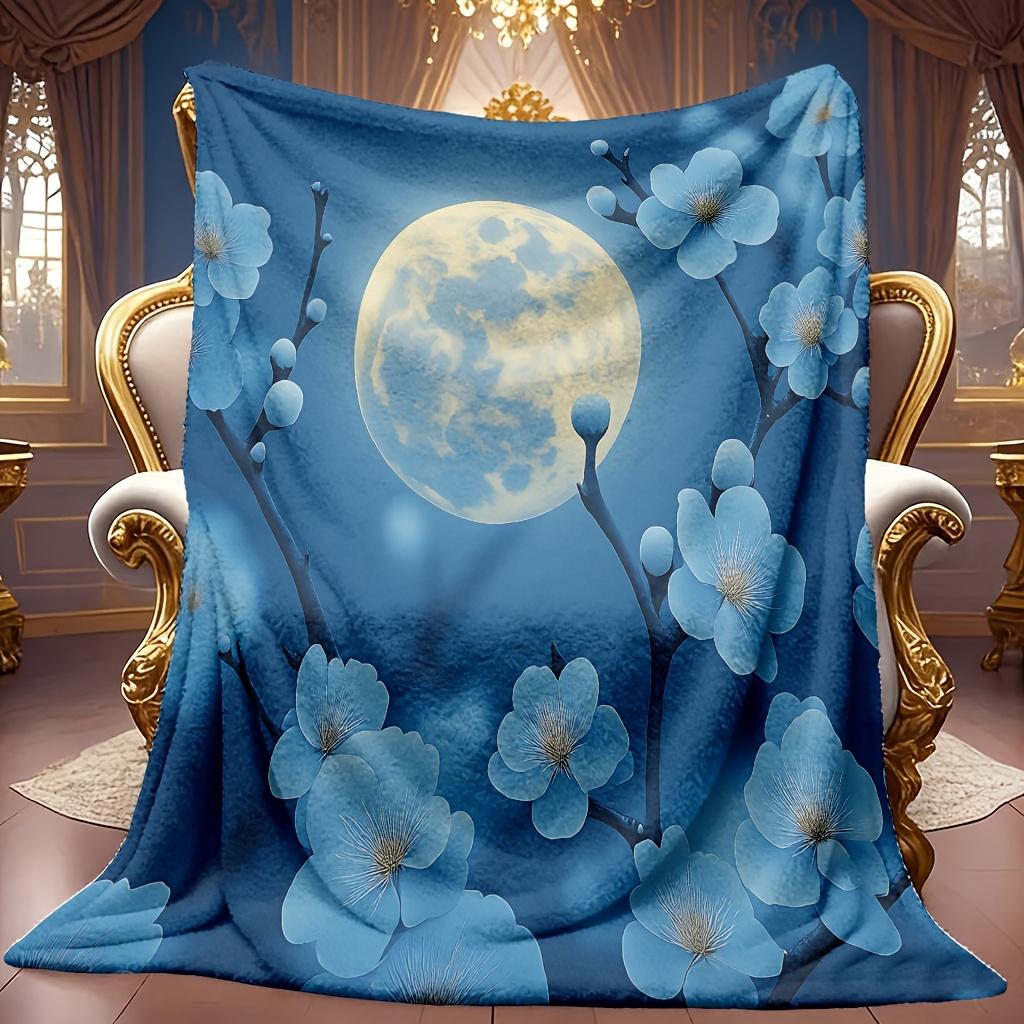 A Cozy Flannel Blanket Featuring a Moonlight Blue Floral Design, with a Soft High-Definition Digital Print. This Cooling Blanket Is Suitable for All S