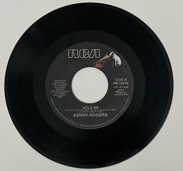 

7inch Record KENNY ROGERS - Eyes That See In The Dark PB13774 RCA 1983 Canada Country/Folk Used