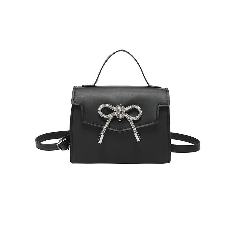 

Маленькая свежая простая квадратная сумка с бантом в иностранном стиле для женщин 2024 года, новая фактурная однотонная сумка через плечо чёрный