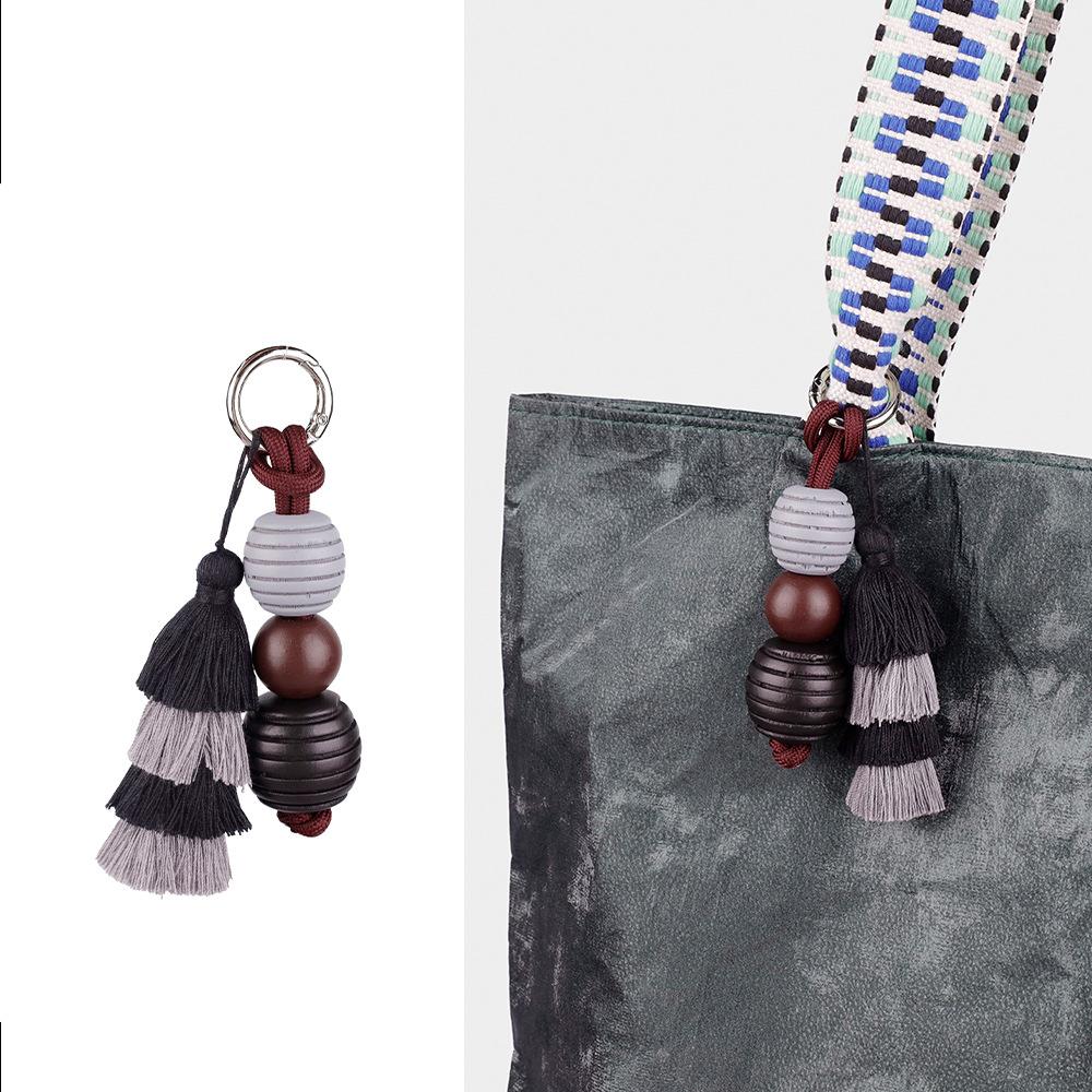 Hochwertiger Taschenanhänger mit niedlichem Ball und Dopamin-Quaste, fester Schlüsselanhänger-Zubehör, vielseitige kreative Mode-Serie