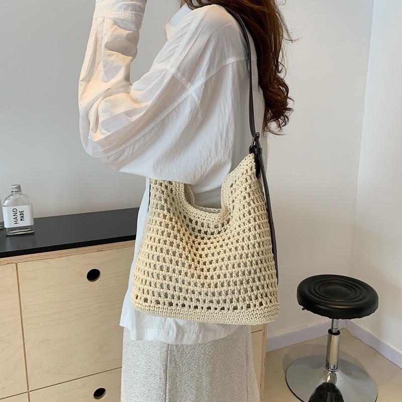 Damentasche neue Mode lässige Strandtasche gewebt tragbar Schulter große Kapazität Hohltasche