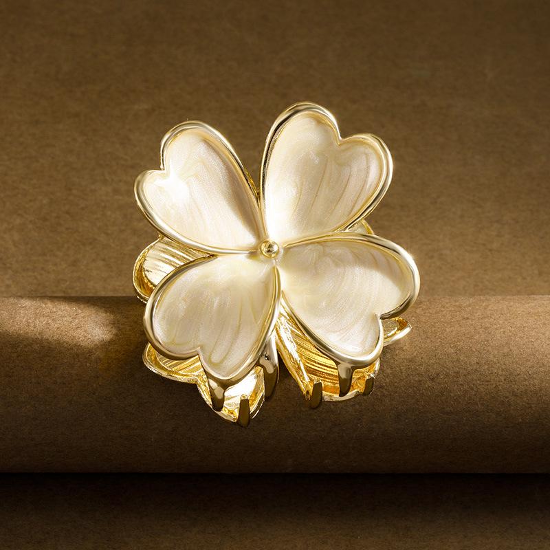 Elegant Four-Petal Metal Flower Hair Clip for Buns
