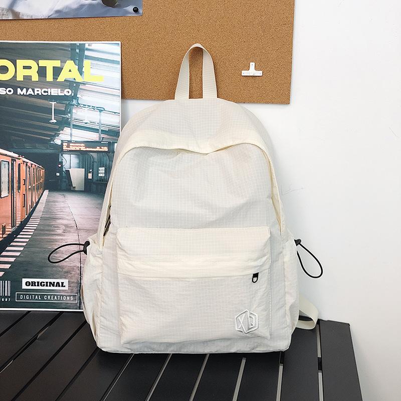 School bag Korean version ins high value backpack early high birth girl casual simple commute versatile large capacity