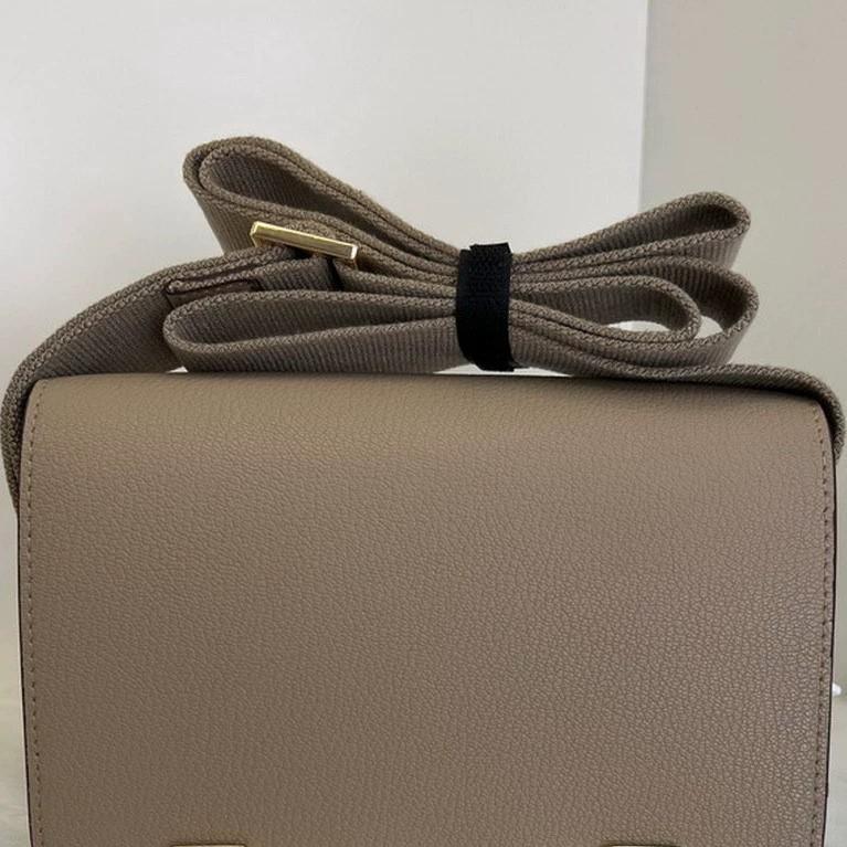 2025 New Leather Women's Bag Goat Pattern Leather Men's and Women's Same Clogs Wide Shoulder Strap Epoxy Leather Color Buckle Cross-border Wholesale