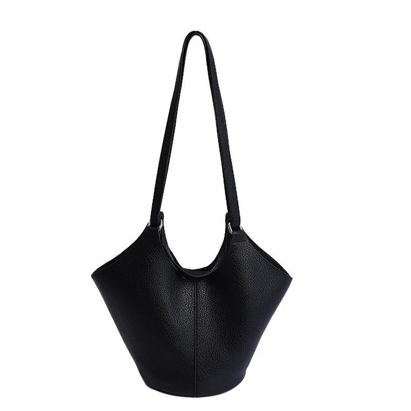 Niche high-end soft leather vegetable basket hand carrying bucket bag women's new commuter shoulder armpit bag