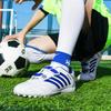 28-38 Stoßdämpfende, rutschfeste, verschleißfeste Klettverschluss-Kurznagel-Outdoor-Fußballschuhe, die Kinderschuhe trainieren