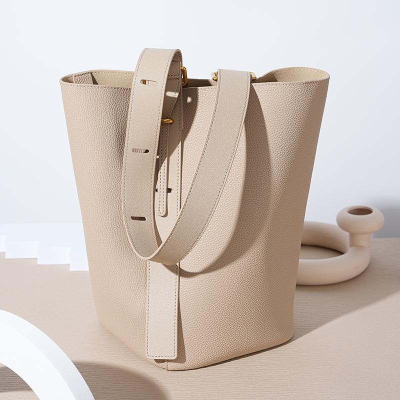 

Дизайнерская женская плечевая сумка из кожи высокого класса, легкая роскошная通勤 коровья кожа большой вместимости сумка-мессенджер-ведро