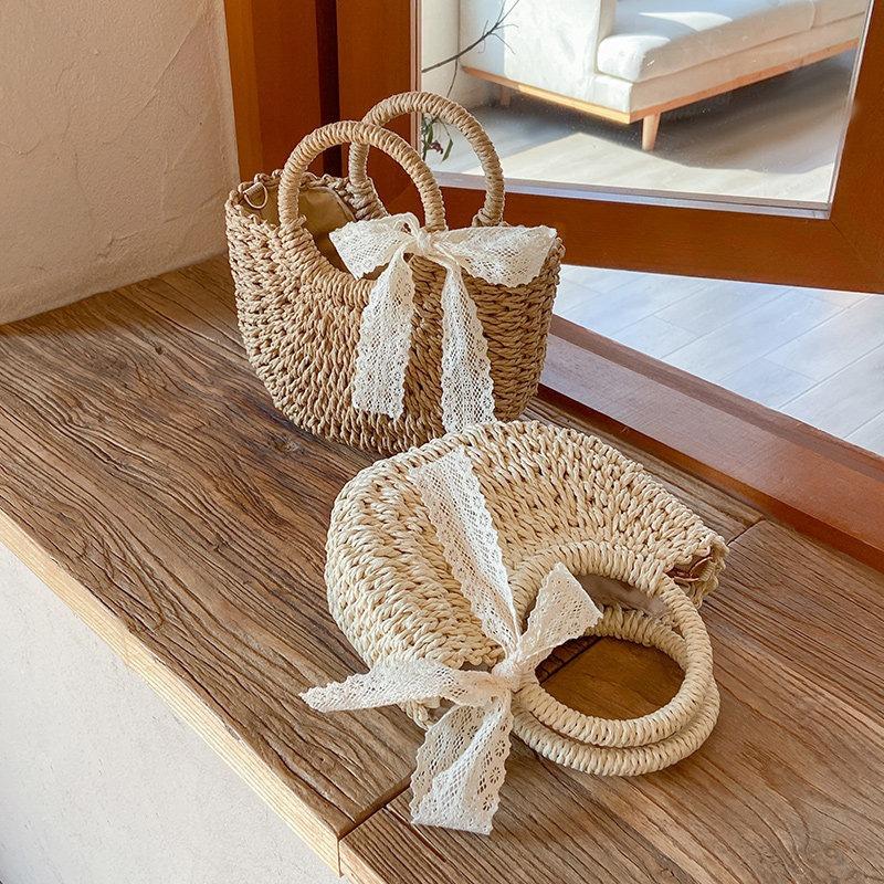 Summer woven bag women's niche design semi-round straw woven bag leisure vacation wind beach bag women's portable messenger bag