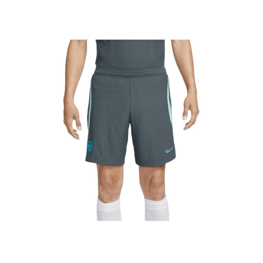 Nike FC. Barcelona Strike Elite Toppa Logo Vita Elastica Pantaloncini da Calcio Uomo Pantaloncini Verde Chiaro FD4142-437
