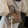 New trend casual simple wind portable bucket bag high-end lychee pattern messenger women's bag