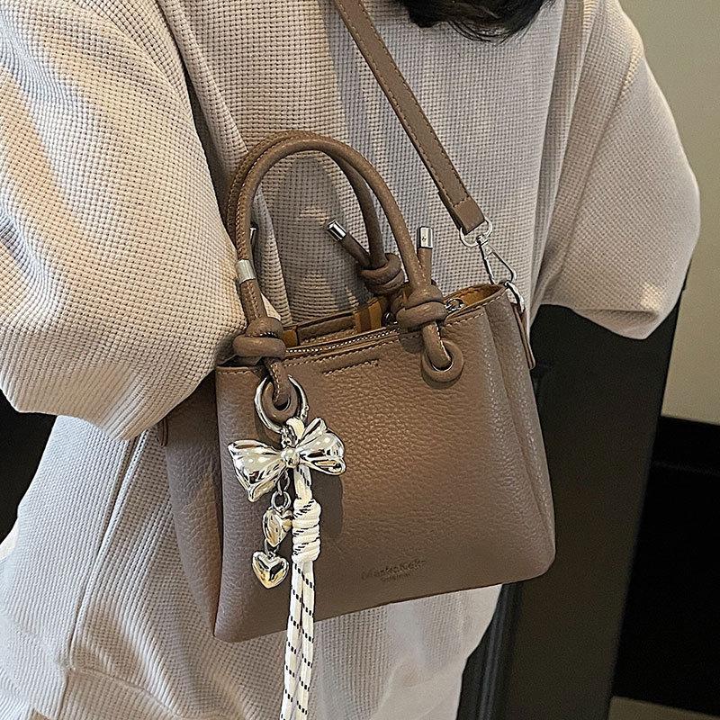 New trend casual simple wind portable bucket bag high-end lychee pattern messenger women's bag