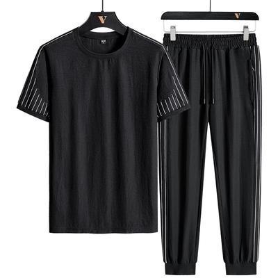 Survêtement de sport décontracté pour homme, cool et élégant, associé à un t-shirt à manches courtes pour homme en deux pièces