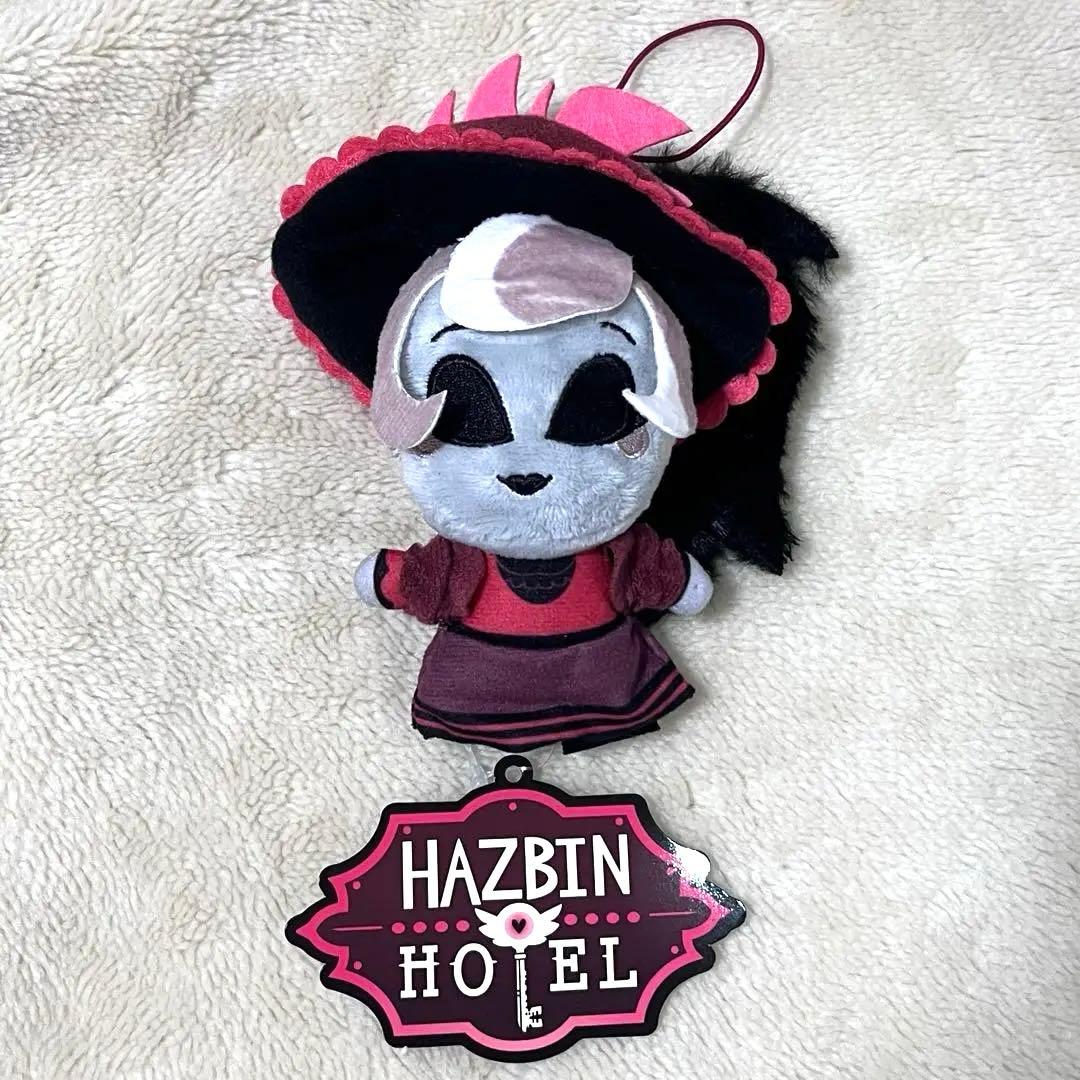 Welcome Hazbin Hotel. Sitting mascot Rosie.