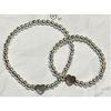 Set of 2 Elastic Beaded Bracelets In Stainless Steel Heart
