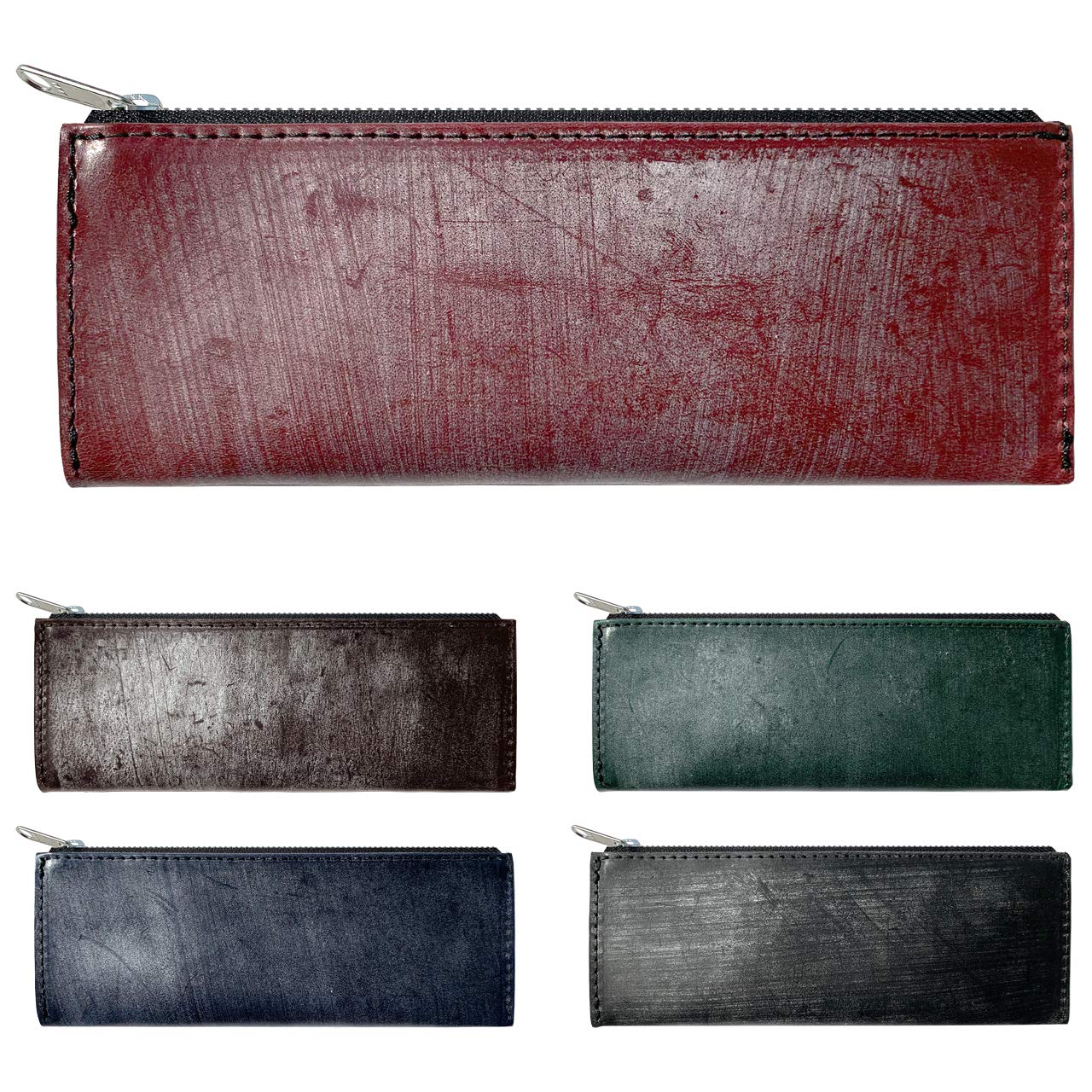 

Slim, compact, and simple pencil case made of tanned bridle leather with YKK zippers. Wine red.