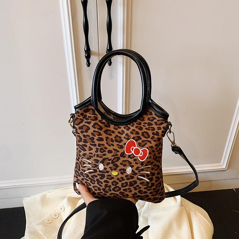 

Kid s Cartoon Kitten Shoulder Bag – Cute, Large Capacity, Practical & Versatile Handbag for Girls, Can Be Used as a Commuter or Crossbody Bag.