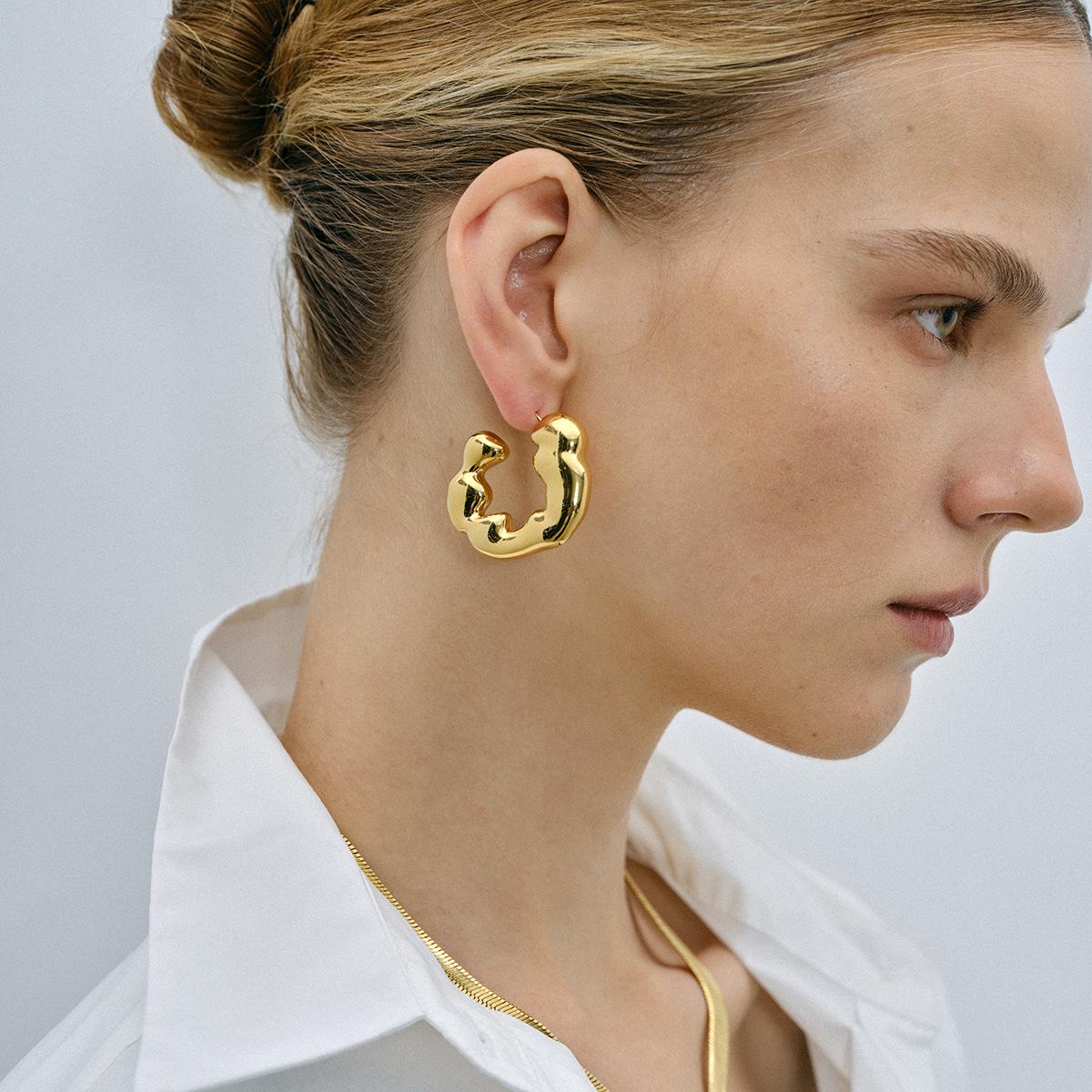 

2024 Irregular Ripple C-Shaped Earrings: 18k Gold & Stainless Steel in European-American INS Style.