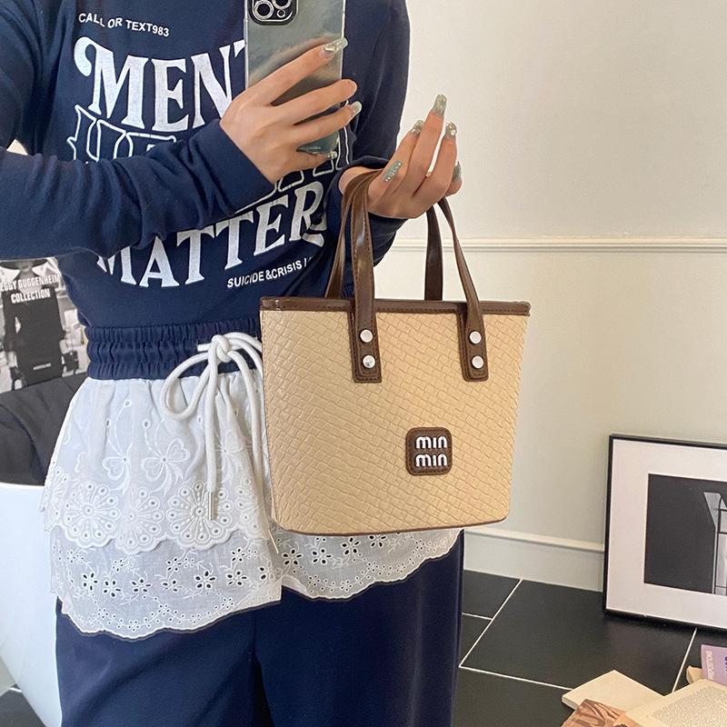 Today's popular hand-carried bucket bag women's new summer high-end sense versatile commuter shoulder messenger bag