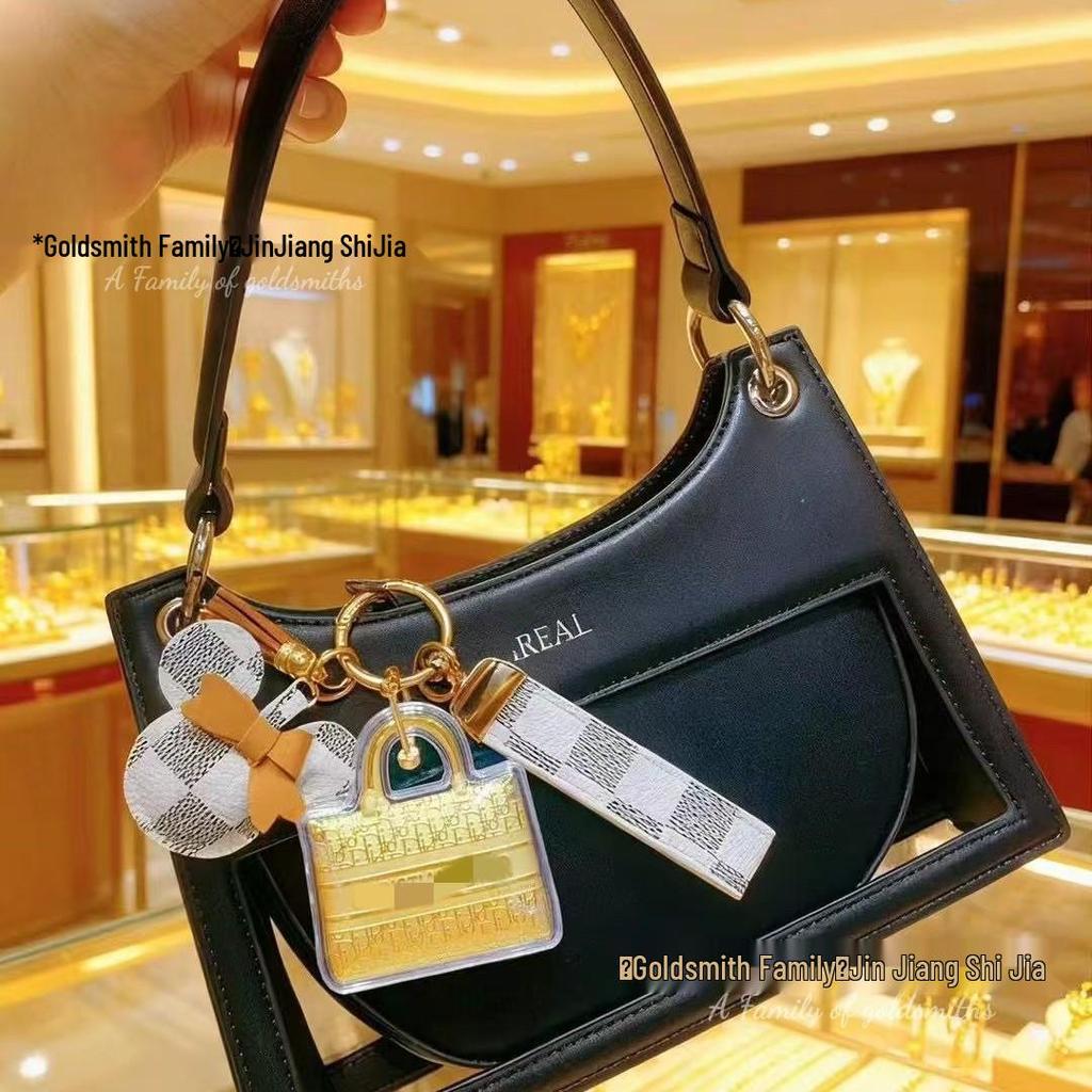 Hästens år 999 Rent Guld Välståndsnyckelring – Gyllene Ponny med Rosa Blomsterberlock för Mobil- eller Väskdekoration