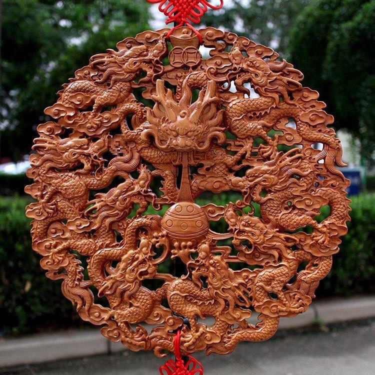 Nine Dragons Peach Wood Pendant: Hand-Carved Hanging Ornament for Home Entrance or Living Room Decor.