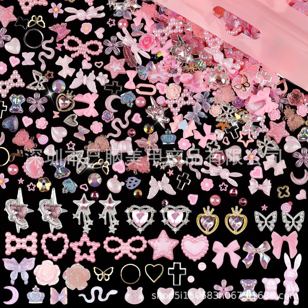 650PCS Mixed Nail Art Kit: Bows, Chrome Hearts, Pearls, Rivets, and Fairy Style Colors.