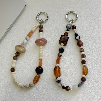 Příslušenství k mobilům – Řemínky na telefony a klíčenky