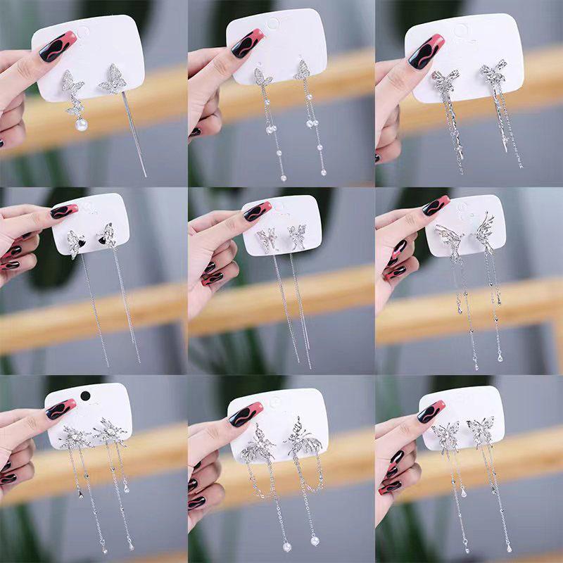 Pinkdudu Mode froid Style papillon longues boucles d'oreilles lumière luxe symétrique papillon frange boucle d'oreille pour les femmes PD1494