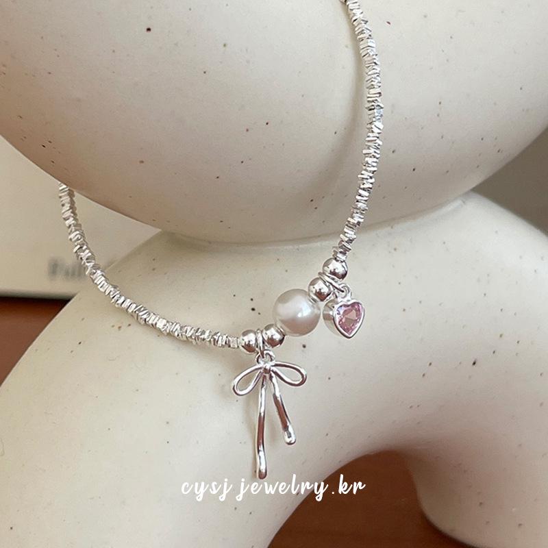 Cui Yan S925 Sterling Silver Korean Bow Bracelet with Pearl Flakes - Elegant and Sweet Design for Women