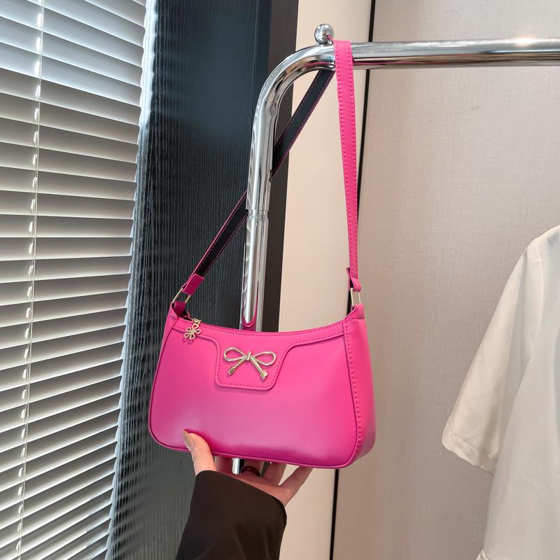 Fashion bow 2025 solid color new Korean version trendy texture foreign style commuting single shoulder underarm baguette bag women