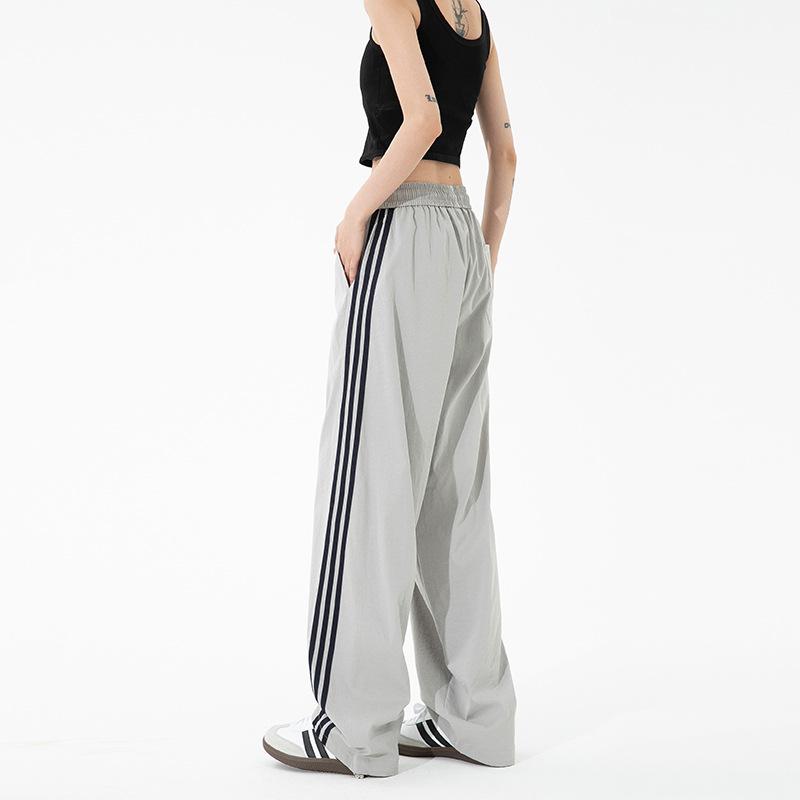 

Paratrooper pants women s outdoor waterproof charging pants men s sports casual trousers high waist wide leg drawstring sweatpants 3XL