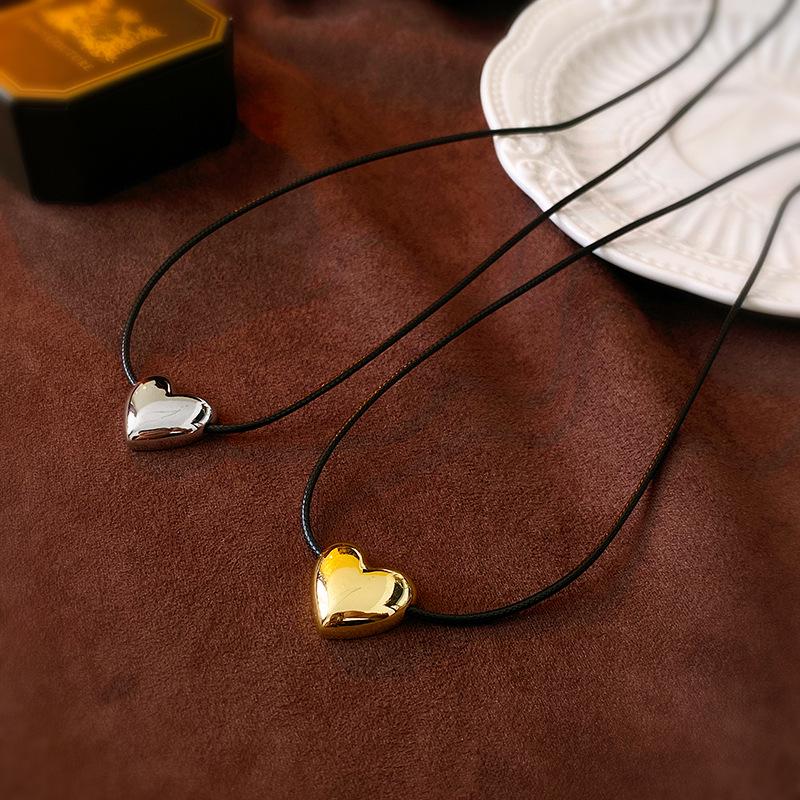 

Minimalist Gold-Plated Heart Necklace with Black Cord